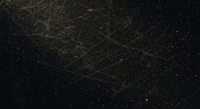 A black and gold background with stars photo