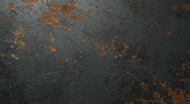 A rusty metal wall with a black paint photo