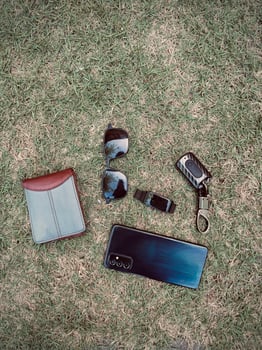 Everyday Essentials on Grass for backgrounds photo