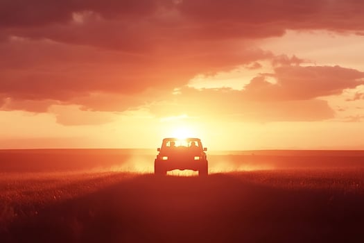 Tourists enjoying safari at sunset in a 4x4 vehicle photo
