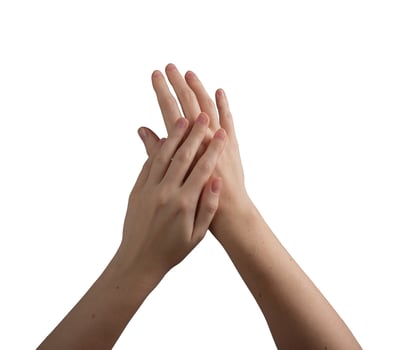 Female hands with well-groomed, glossy nails gently positioned to highlight beauty, skincare, and photo