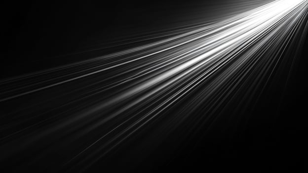 Abstract light streaks cutting through darkness create an eye-catching pattern. The luminous lines converge, forming a bright visual accent. photo