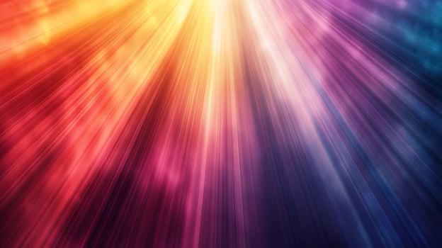 Abstract radiant light background with beams of orange, yellow, pink, purple, and blue emanating from the top center of the frame. photo