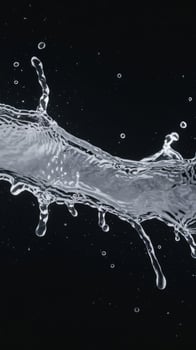 Water splashes isolated on black background white jets with drops photo