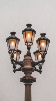 A street light with four lamps on top photo