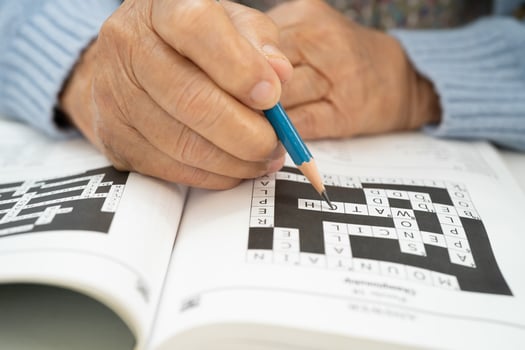 Bangkok, Thailand - January 19, 2025 elderly woman playing puzzle game. photo