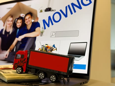 Truck and salary bag on a white background. Moving truck money photo