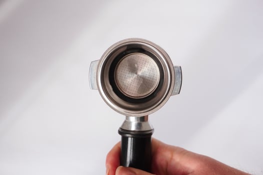 Portafilter on white background photo