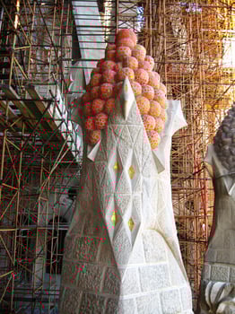 Sagrada Familia tower. Sagrada Familia spire amidst scaffolding. Detailed architecture of Holy Family church tower top section with details of construction support. Barcelona, Spain - October 23, 2009 photo