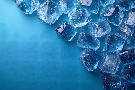 Abstract Ice Cubes on Blue Surface for Cooling and Refreshment Concepts photo