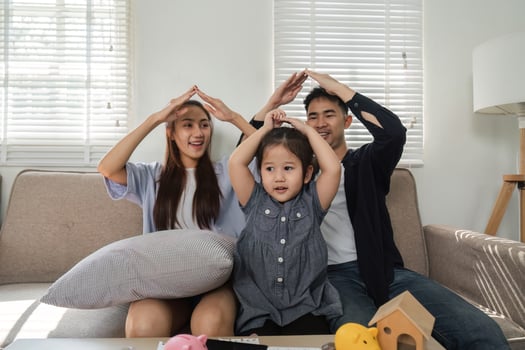 Family playing a fun game, creating a playful atmosphere at home. photo