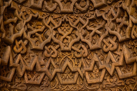 Details of the carved stone decoration of the mihrab of Great Mosque of Divrigi photo