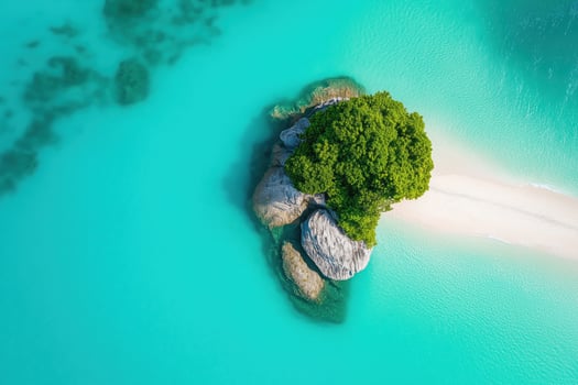 Aerial View of a Small Tropical Island with Lush Greenery and Turquoise Water photo
