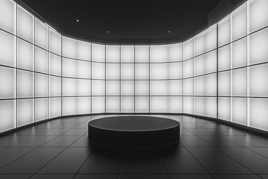 Futuristic circular stage in a brightly lit room with grid walls photo
