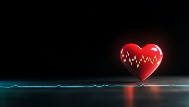 A glowing red heart with an ECG line, symbolizing health and vitality. photo