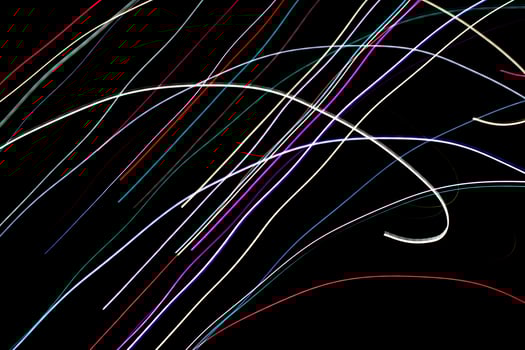 colored lines on a black background. photo