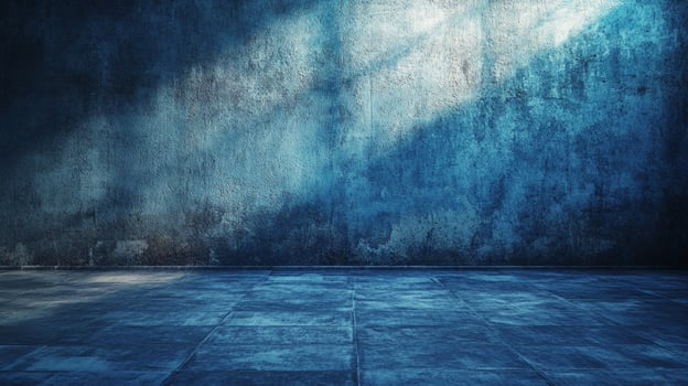 A moody blue room with textured wall and tiled floor, illuminated by soft light. Ideal backdrop for creative projects and designs. photo