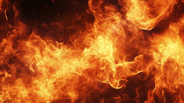 Swirling flames erupt in a vibrant display of intense heat and power, against a dark background, with wisps of smoke adding to the drama. photo