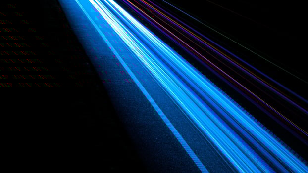 lights of moving cars at night photo