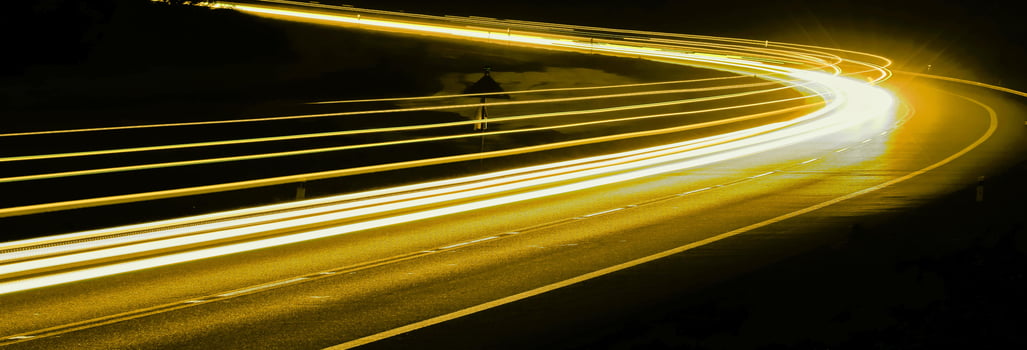 abstract yellow car lights at night. long exposure photo