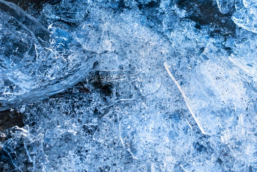 blue ice with visible details and interesting texture photo