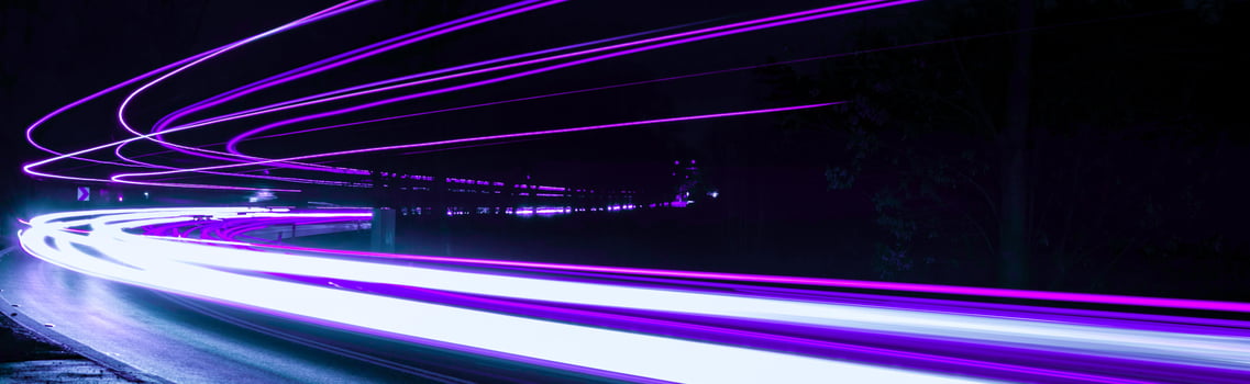 violet car lights at night. long exposure photo