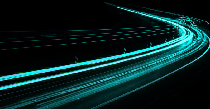 blue car lights at night. long exposure. light trail photo