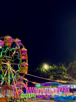 Vibrant Carnival Night with Ferris Wheel photo
