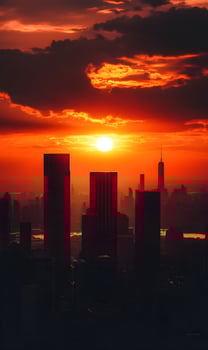 Dramatic Manhattan sunset with towering skyscrapers silhouetted against fiery sky photo