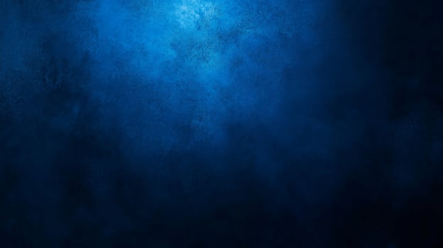 Deep blue textured background evokes a sense of mystery and depth, perfect for creating a moody and atmospheric design photo