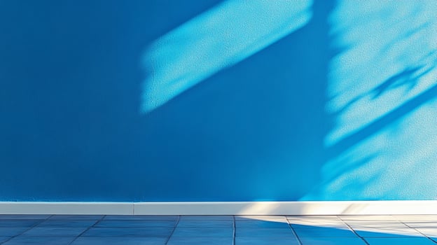 Minimalist blue wall with sunlight casting shadows, creating a serene and modern aesthetic, ideal for simple designs. photo