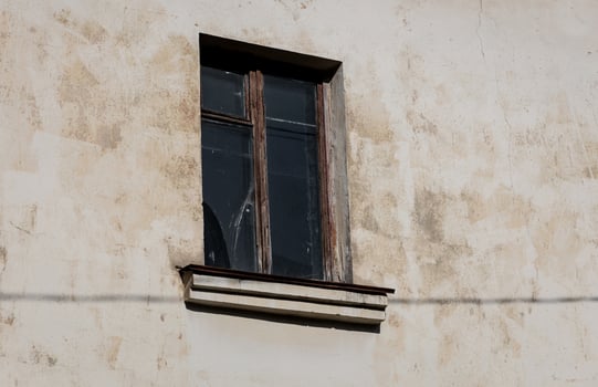 broken window on wall photo