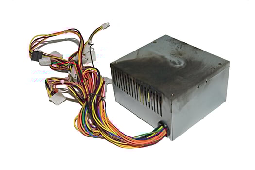 Burnt power supply over white photo