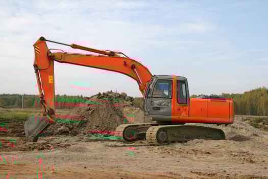 Orange excavator working photo