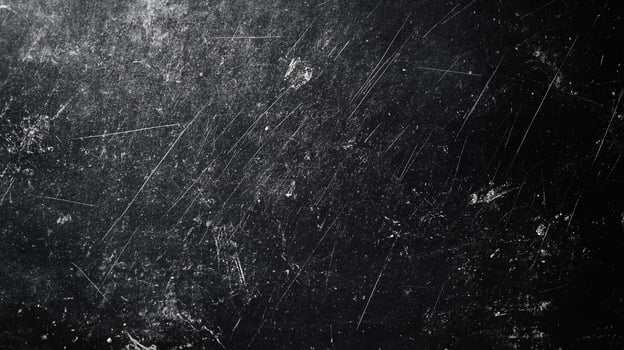 Abstract black and white texture with scratches and dust, creating a vintage or grunge effect. High contrast and detail. photo