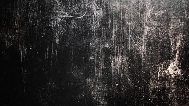 Grungy black surface texture, showing scratches and dust. An abstract design for use as background or overlay to add an distressed feel photo