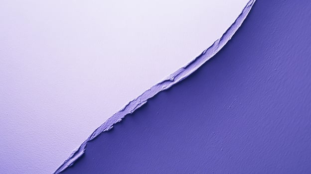 This abstract image displays a creative split texture of purple paint on a canvas, illustrating artistic flair and modern design elements with vibrant colors and contrasts. photo