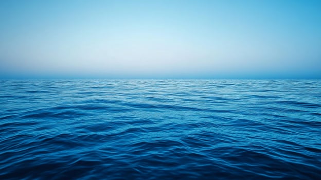 Vast ocean expanse meets a serene sky, a tranquil scene of nature's beauty. Gentle waves create mesmerizing patterns across the water. photo