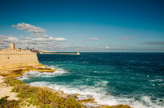Coastal Fortress Overlooking the Blue Sea in Malta photo