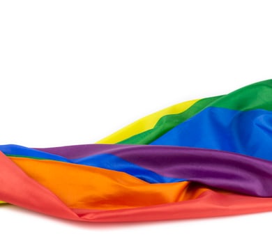 1. Colorful rainbow flag on white background. Concept of cheering LGBT communities all over the world photo