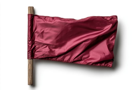 A red flag waving on a white background photo