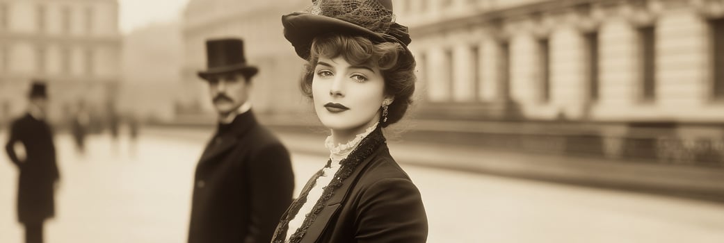 A woman in a hat and a man in a suit photo