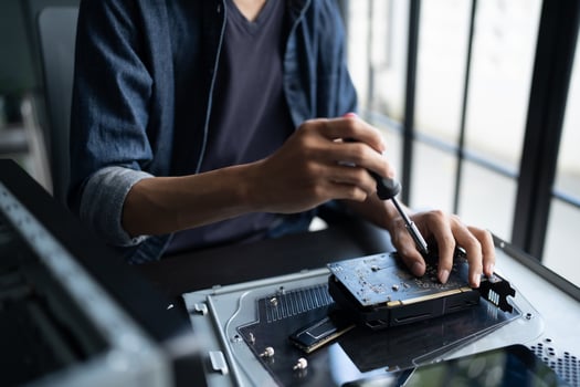 IT Engineer installing Hardware Equipment Development Facility Engineer Maintenance computer Motherboard Electronic repair shop technology business. photo