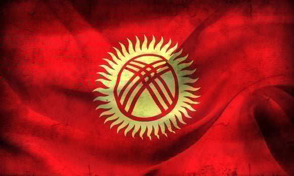 Vintage look 3D-Illustration of a Kyrgyzstan flag - realistic waving fabric flag photo