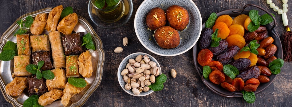 Ramadan iftar traditional desserts baklava and dates photo