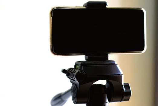 close up of smartphone on a tripod photo
