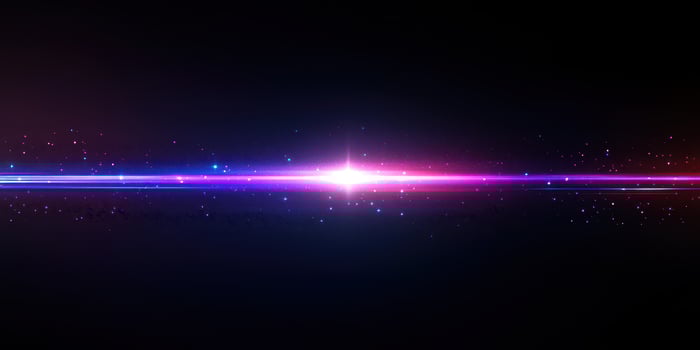 Vibrant cosmic light rays create a stunning visual effect against a dark backdrop in a digital artwork photo
