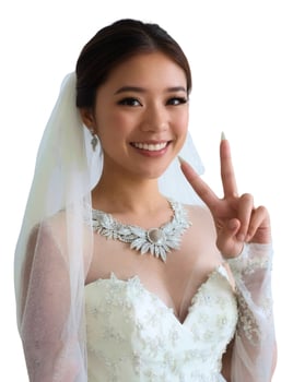 A woman in a wedding dress making the peace sign photo