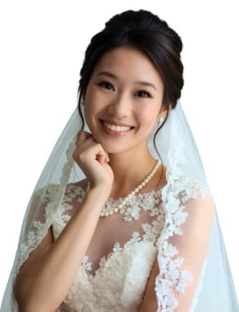 A beautiful young woman in a wedding dress smiling photo