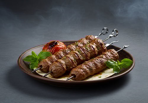 Grilled Lamb Kebabs with Roasted Tomato. photo